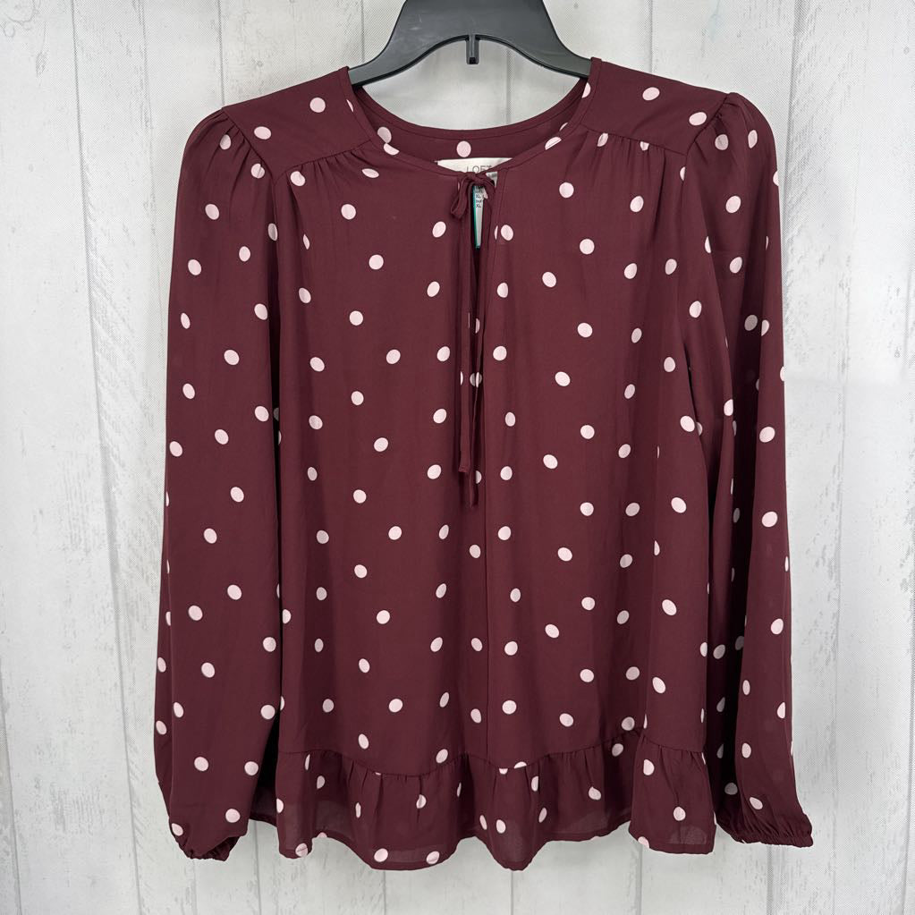 XL polka dot ruffle hem tie front l/s top
