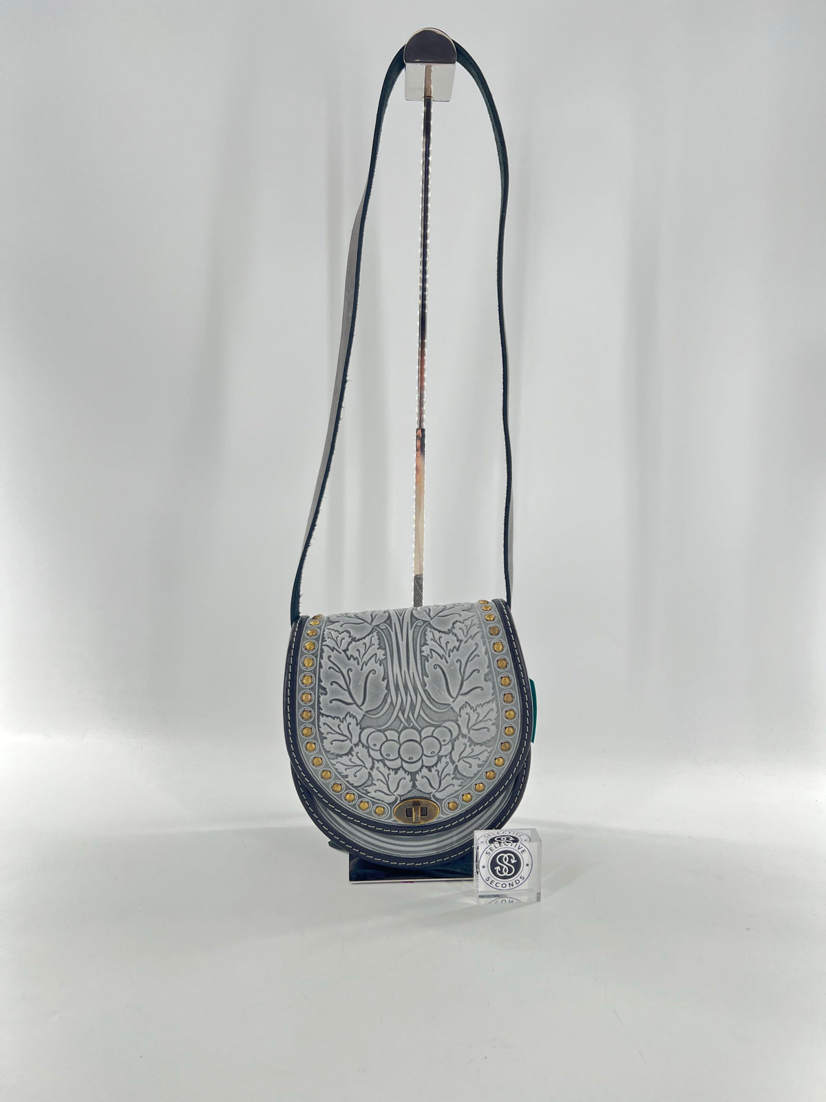 Ukrainian tooled studded turnlock messenger bag