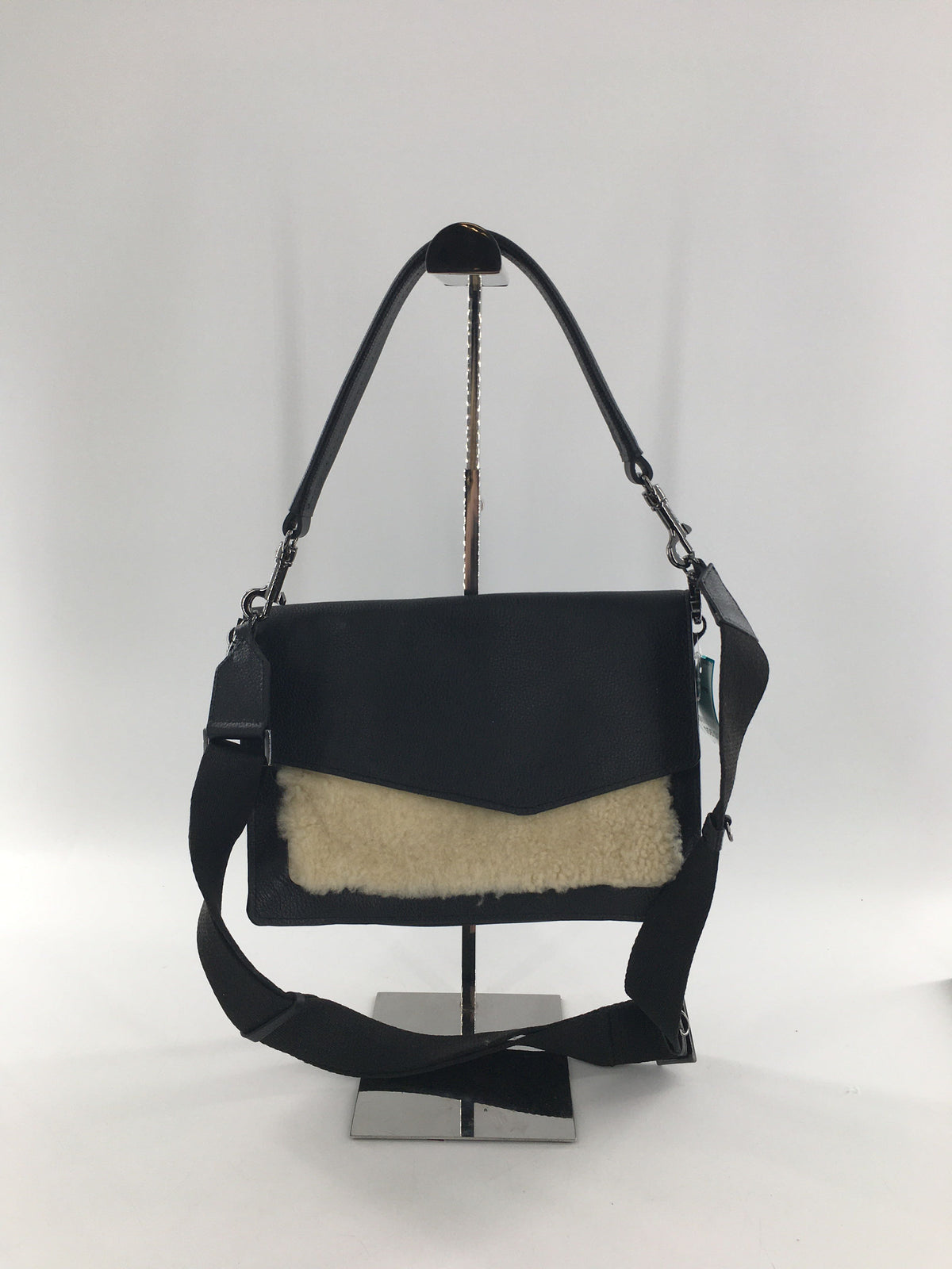 pebbled shearling front flap crossbody
