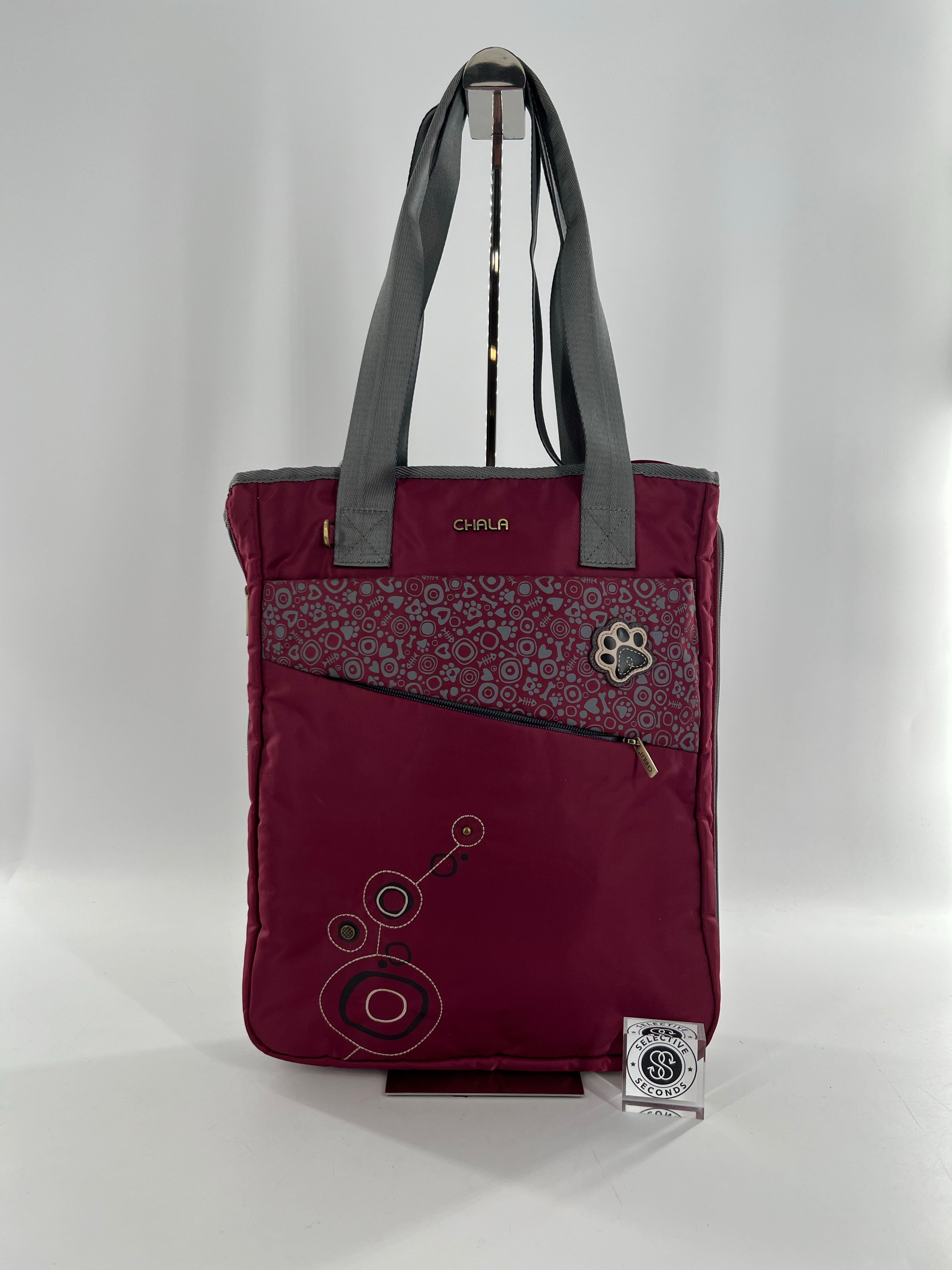 zip around paw print tote