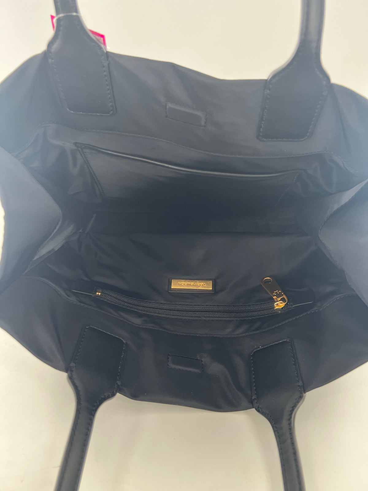 circular studded logo magnetic closure tote