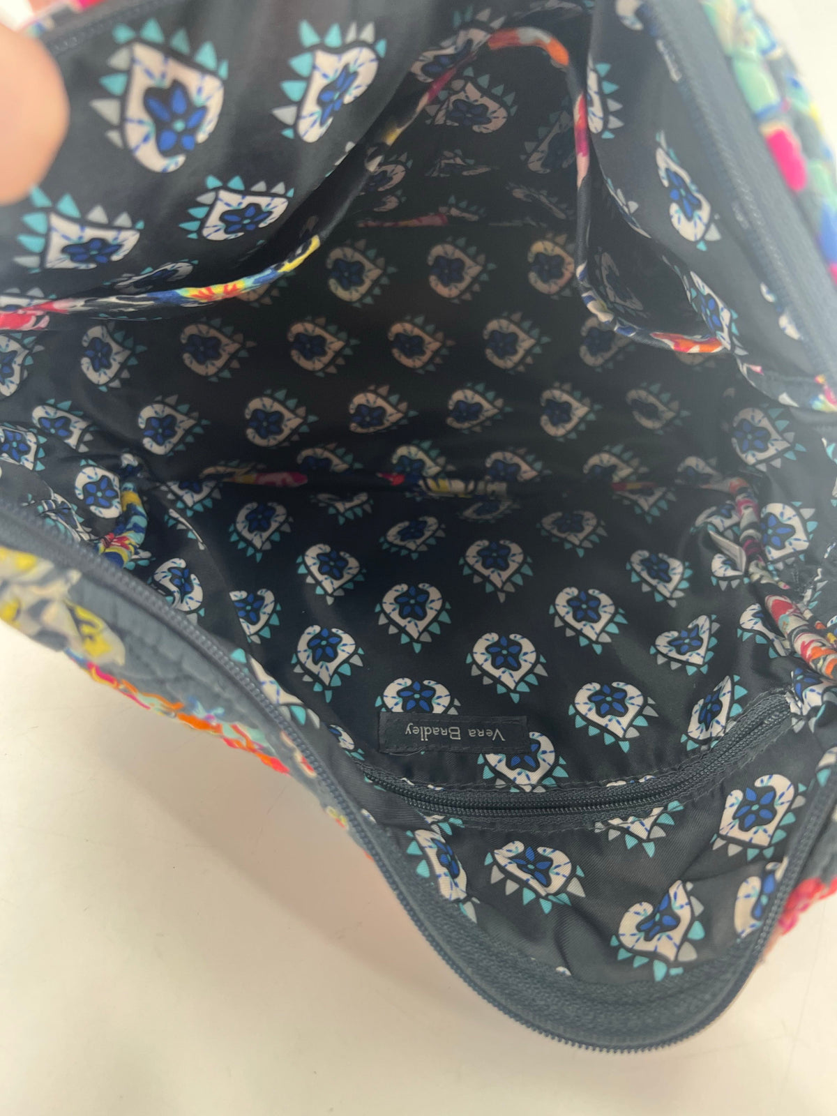 quilted floral zip front pocket crossbody