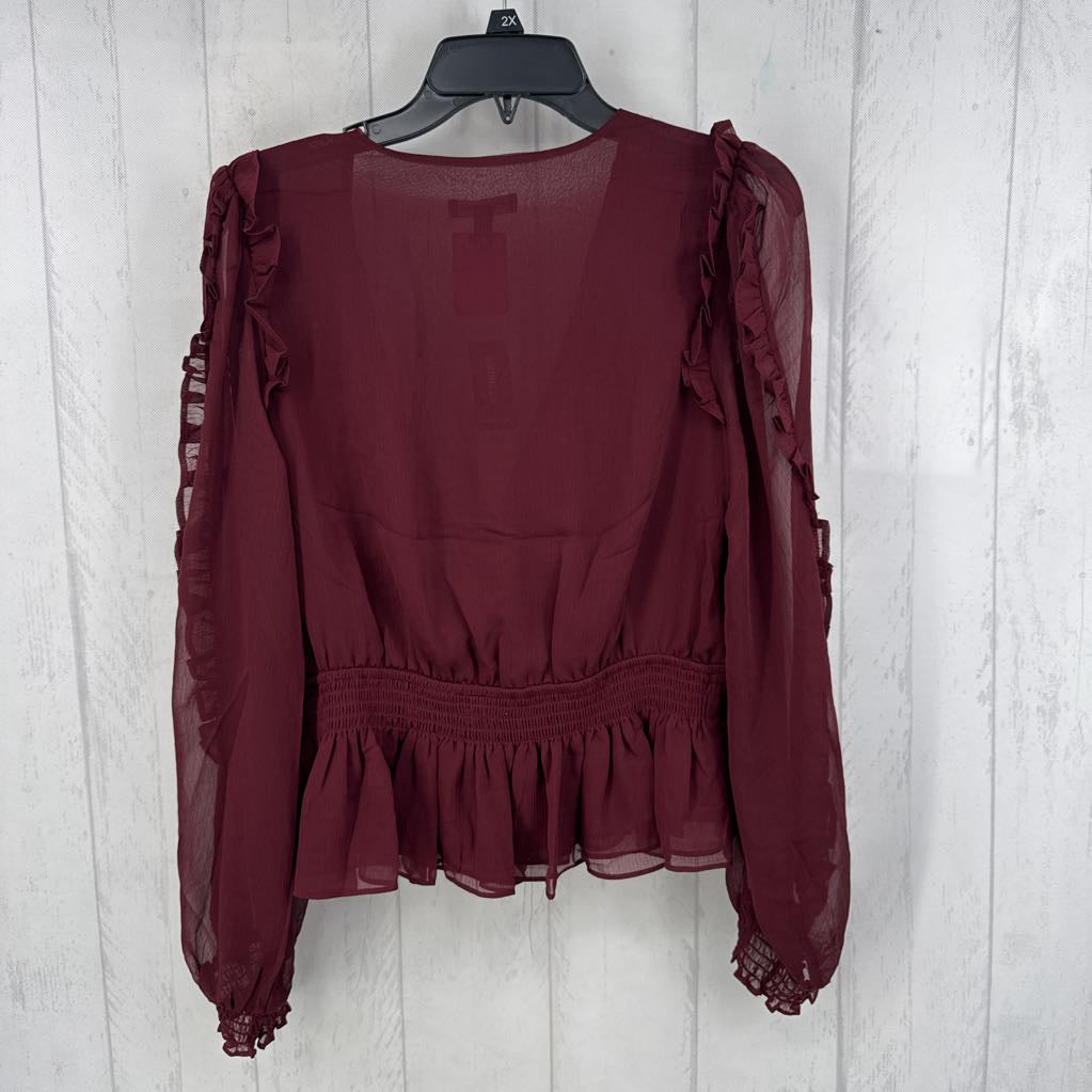 R60 M wrap front v-neck ruffled peplum hem l/s blouse