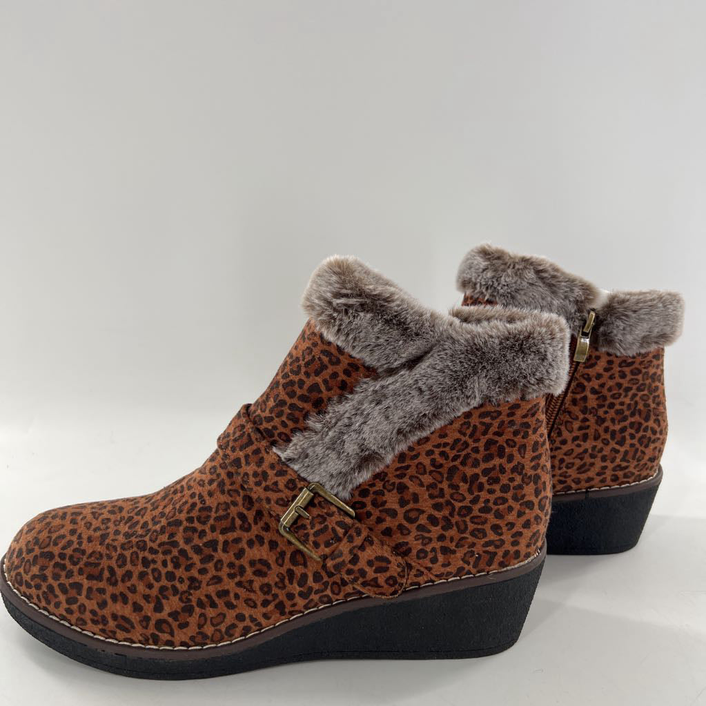 11 faux-fur trimmed animal print wedge heel bootie
