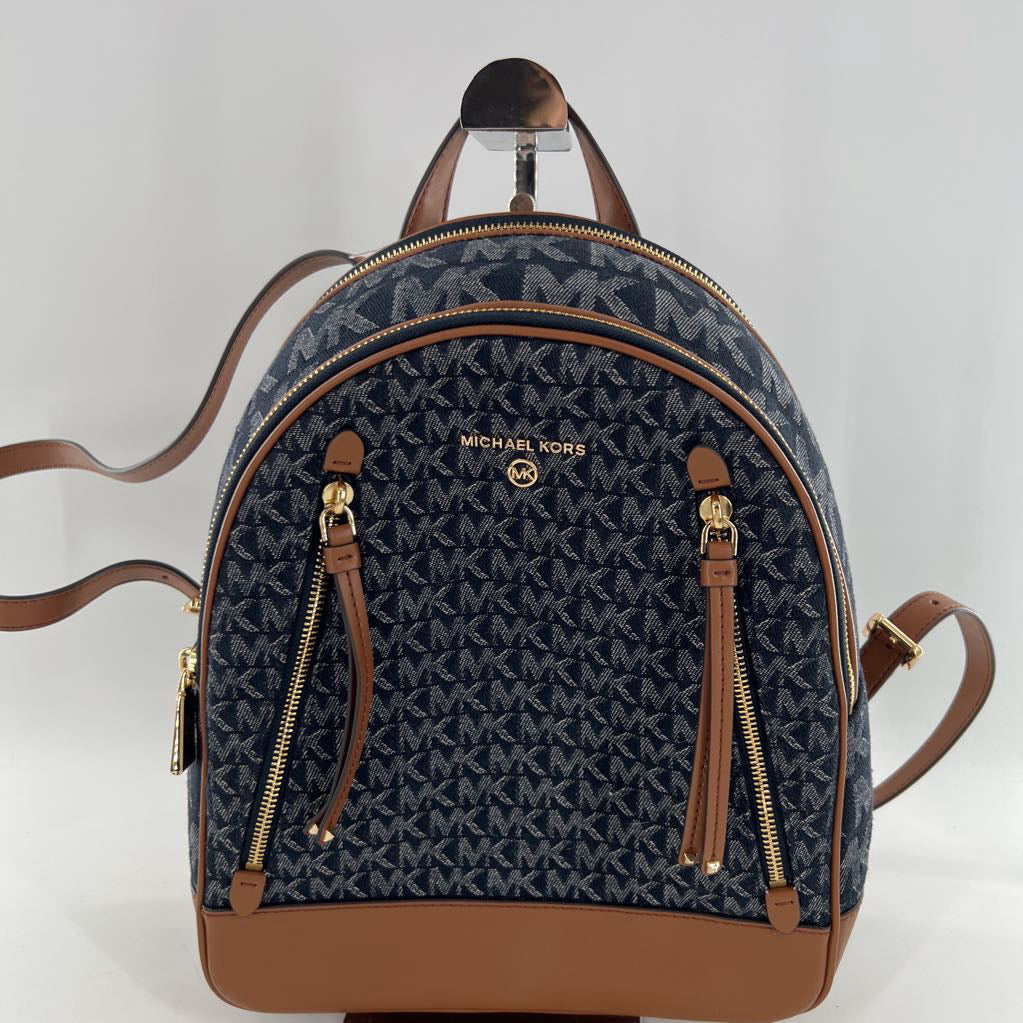 R328 monogram jacquard dernim & leather backpack