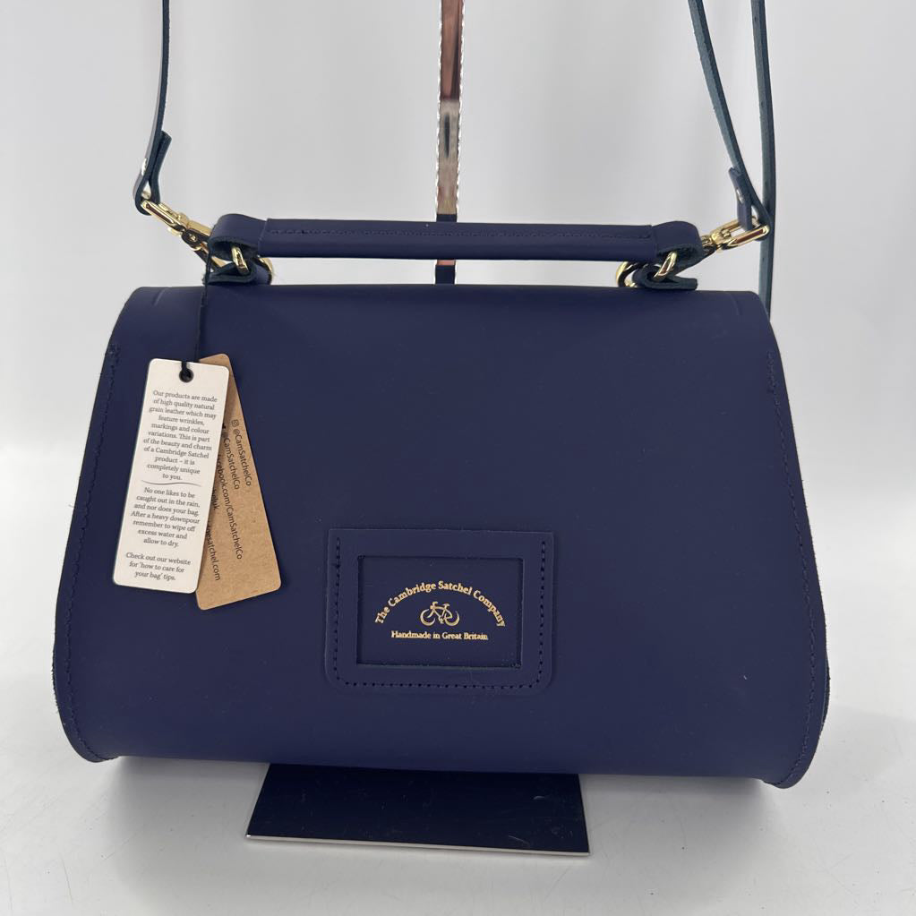 curved shaved pushlock closure satchel