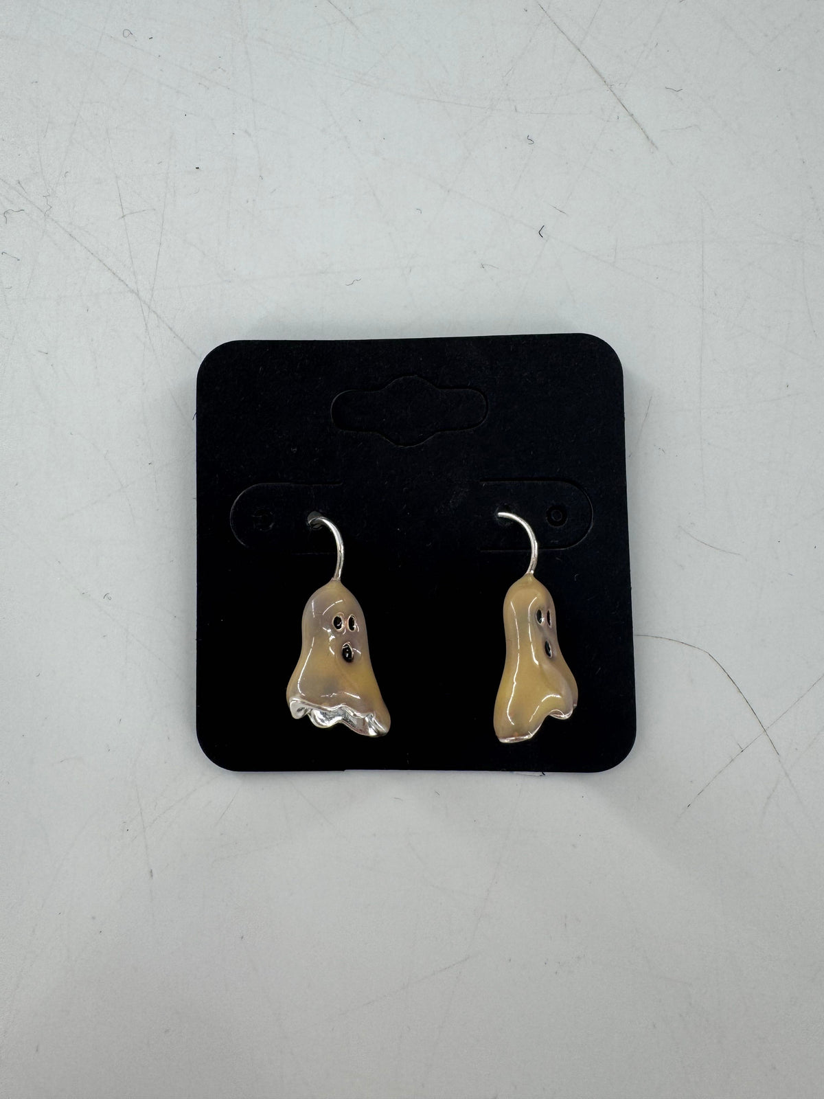 ghost dangle earrings