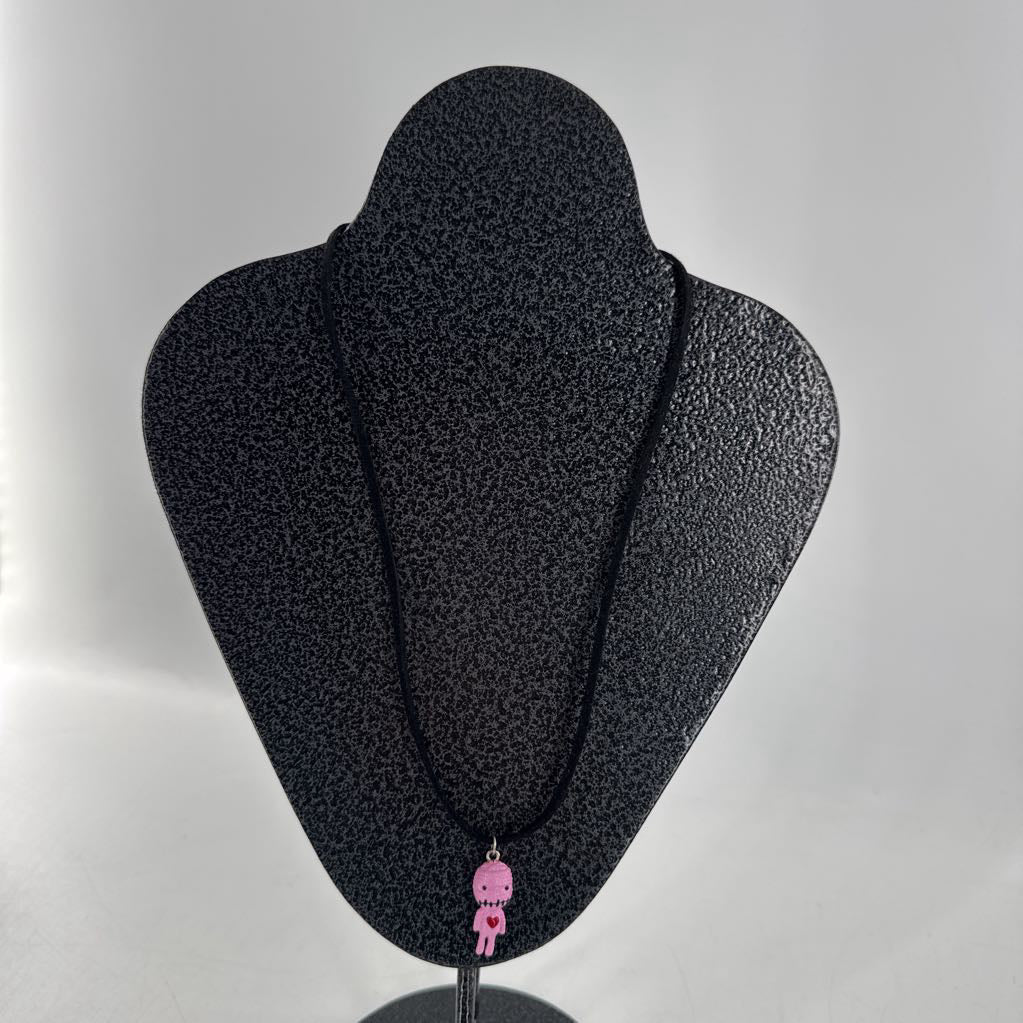 blk rope necklace w/pink yarn doll pendant