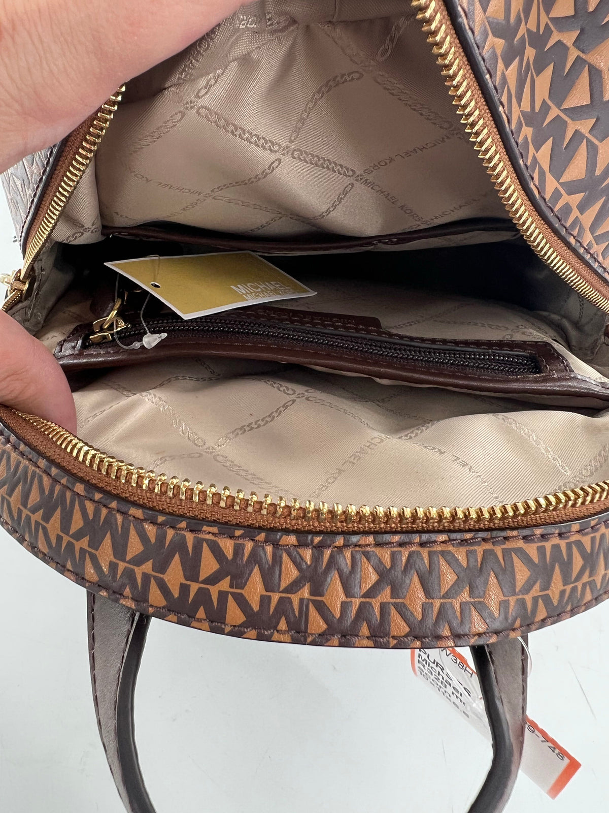 R328 monogram logo double zip med backpack