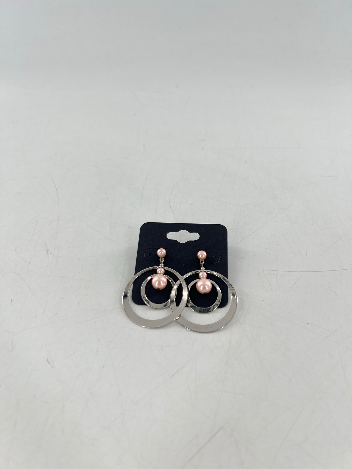 silver circle earrings w/ pink pearls