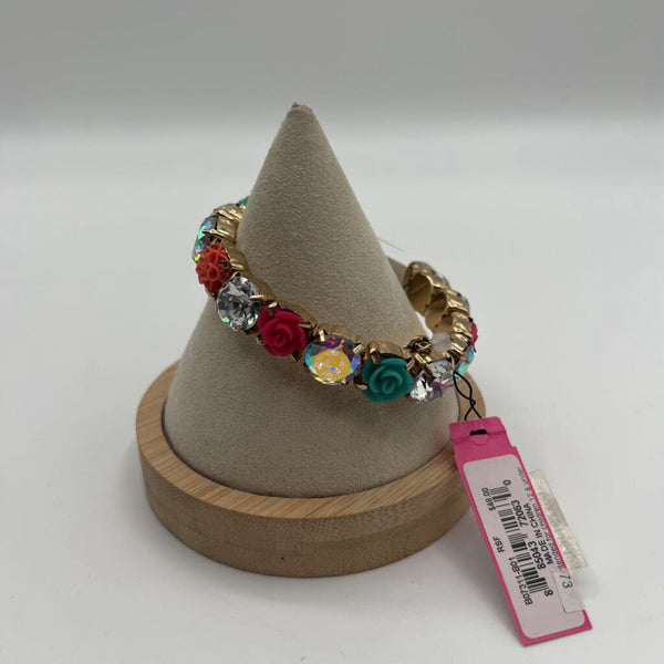 R48 Betsey Johnson goldtone bracelet with flower detail