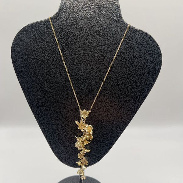 Fossil Goldtone Plumeria drop necklace