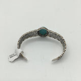 silvertone floral cuff w/turquoise stone