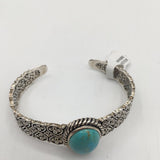 silvertone floral cuff w/turquoise stone