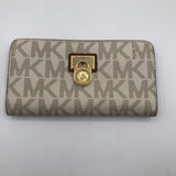 monogram zip around wallet