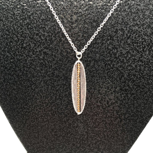 Silvertone necklace w/silver pendant & gold detail