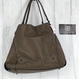 Pebbled leather western rivets bag