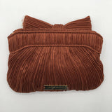 rayne pleated bow clutch