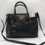 footed quilted turn lock satchel