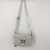 R258 heart flap crossbody