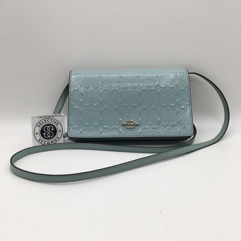 monogram embossed flap crossbody