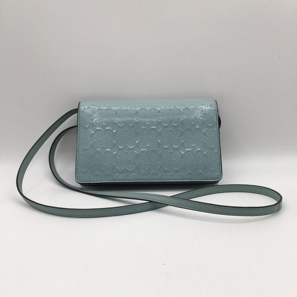 monogram embossed flap crossbody