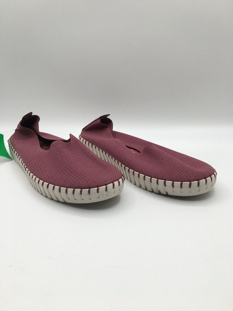 11 Perforated slip on memory foam shoe