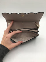 R249 scallop bi-fold wallet on a chain