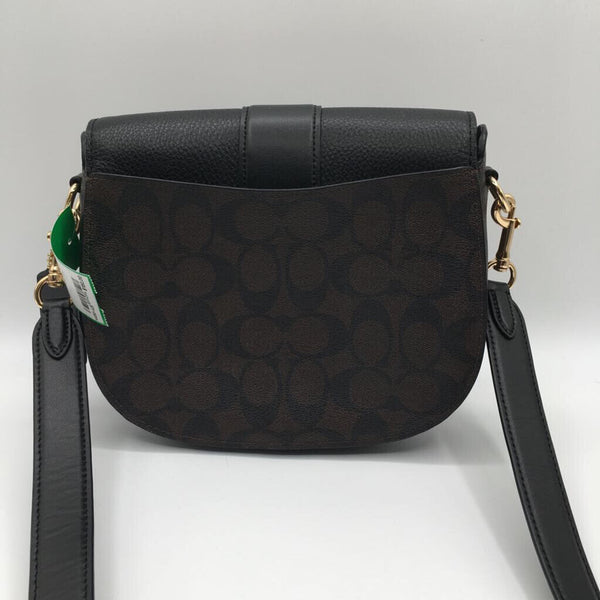 signature saddle crossbody