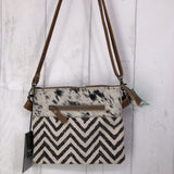 Staggering cross body bag