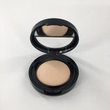 0.14 oz Laura Geller baked blurring+setting powder porcelain/fair