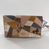 foldover crossbody clutch w/ signature patchwork