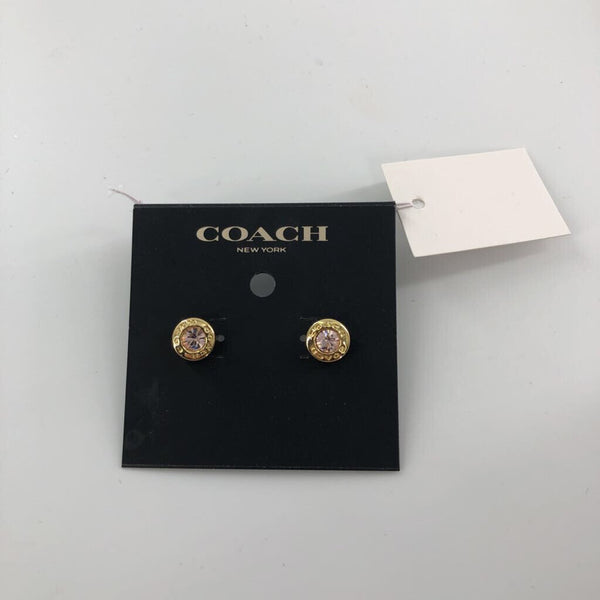 R68 Coach open circle stone sude earrings