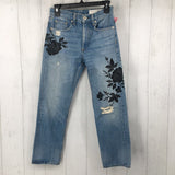 24 distressed flower embroidered jeans