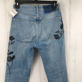 24 distressed flower embroidered jeans