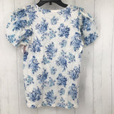 R60 XS Flo print ruffle slv top