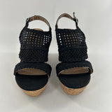 8 Perforated wedge heel sandal