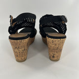 8 Perforated wedge heel sandal