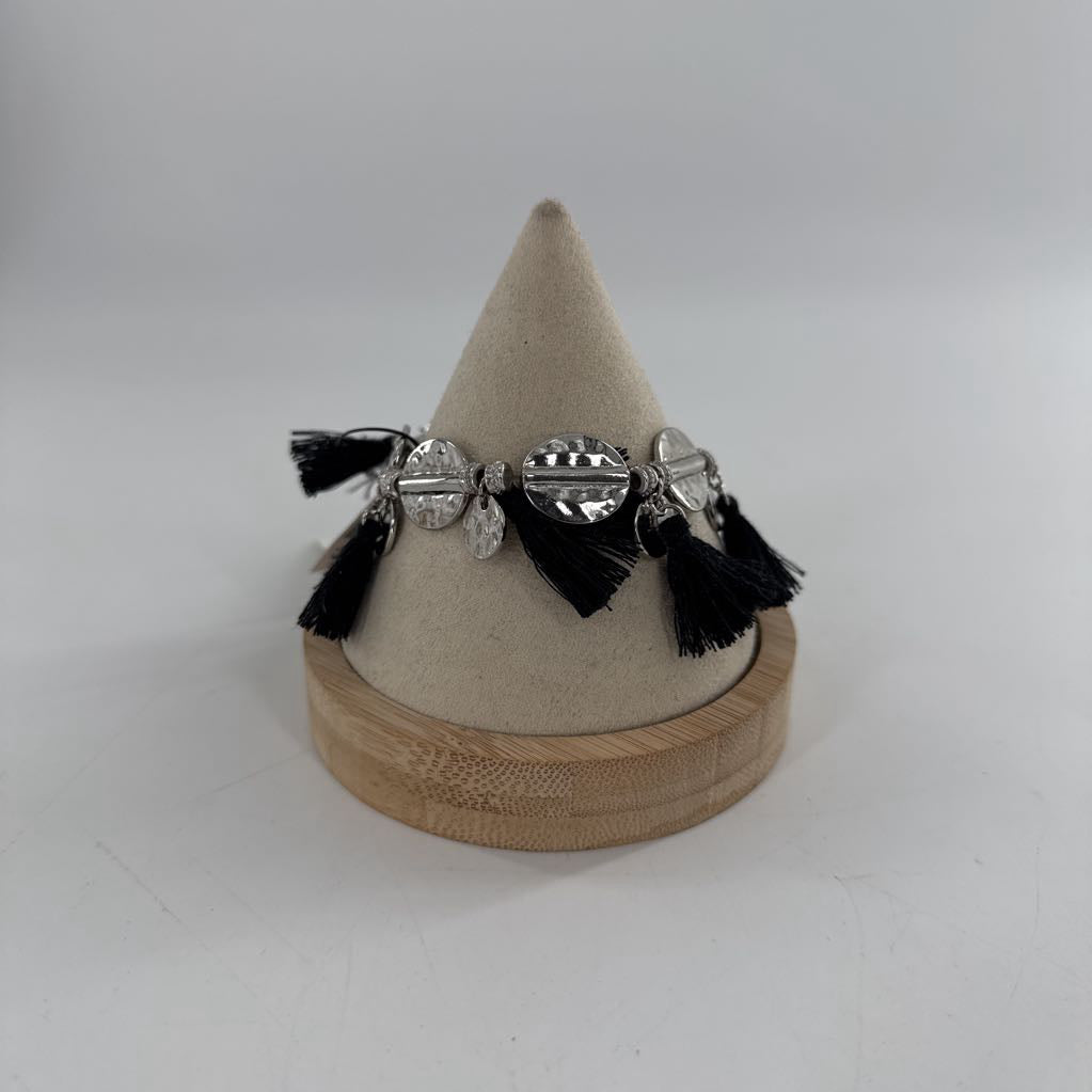 R20 silvertone stretch bracelet w/ blk tassels
