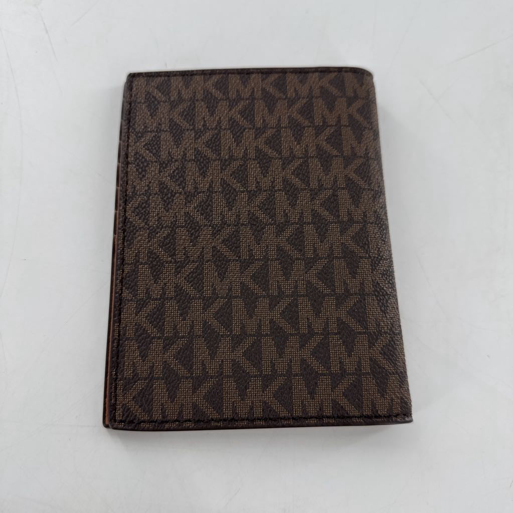 monogram flip wallet