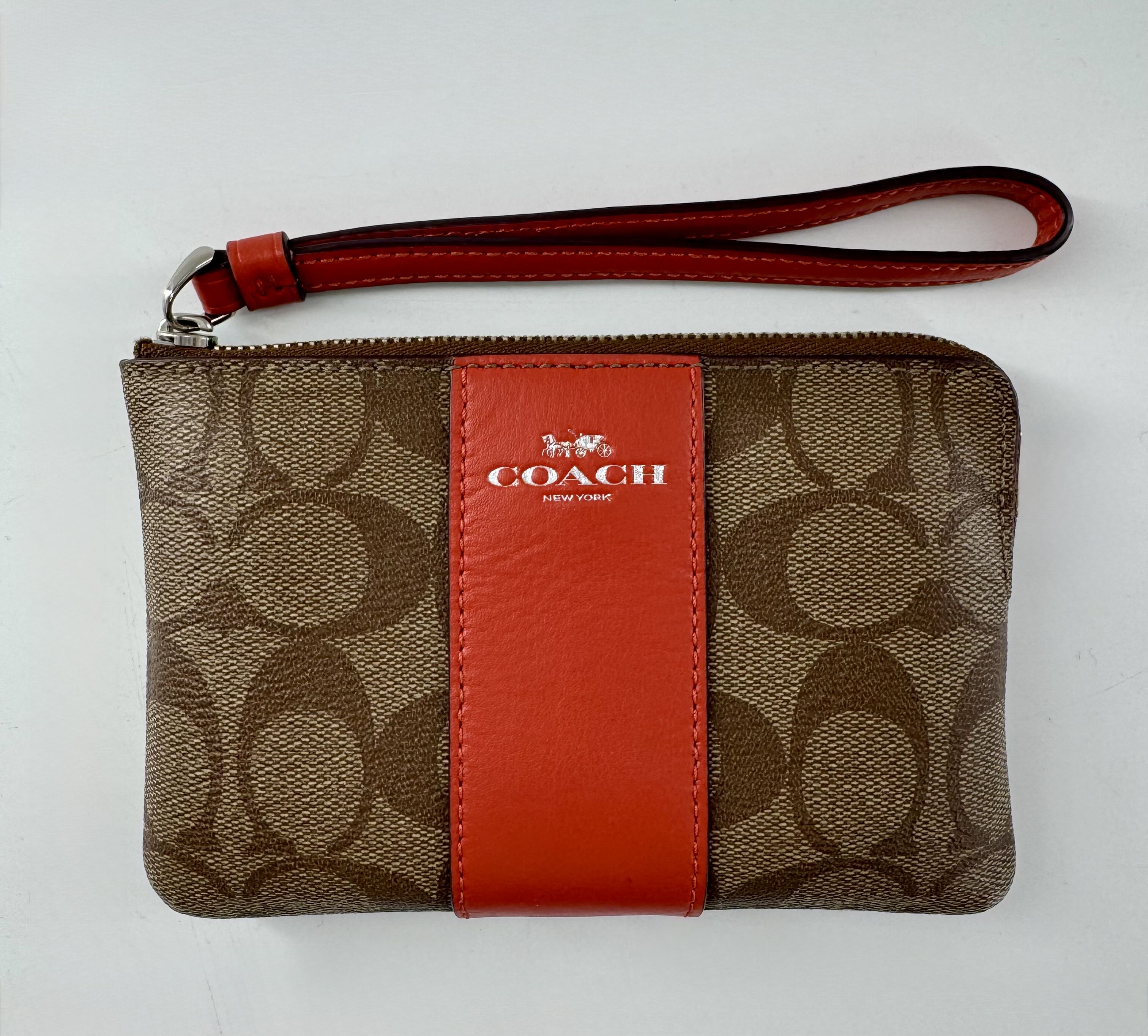 R75 signature stripe wristlet