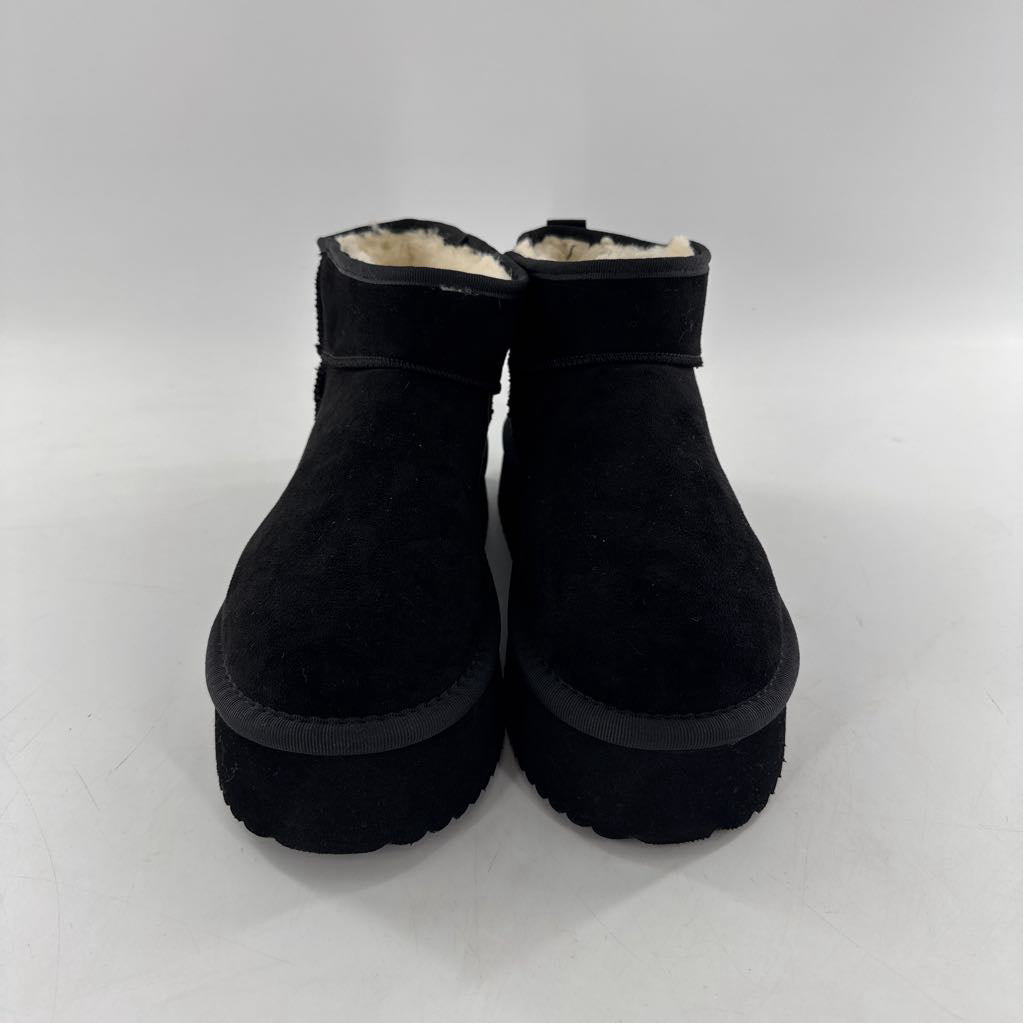 7 platform faux fur lined boot