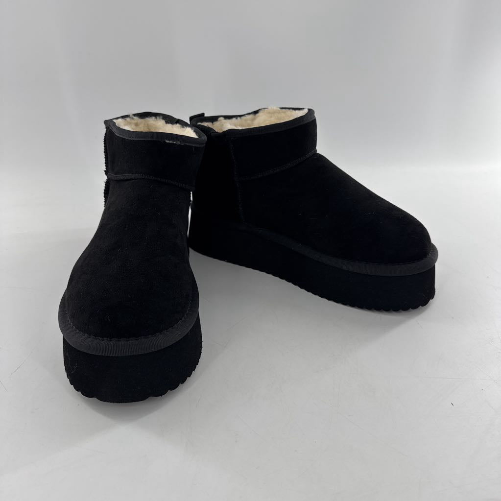 7 platform faux fur lined boot