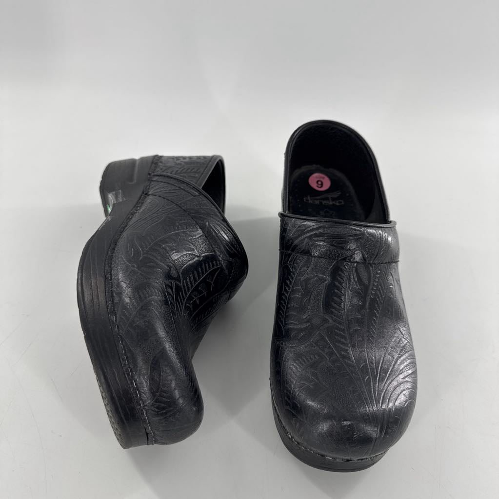 9 embossed leather clogs