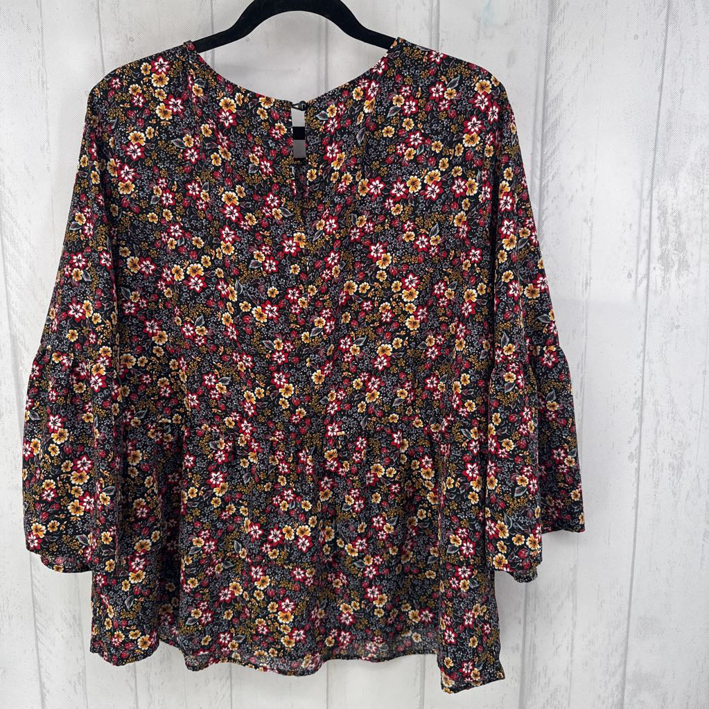 XL flo print ruffled hem top