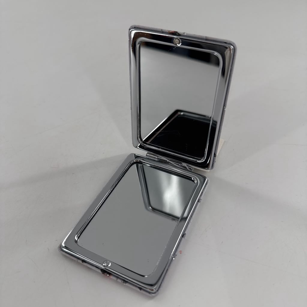 compact mirror-pink roses