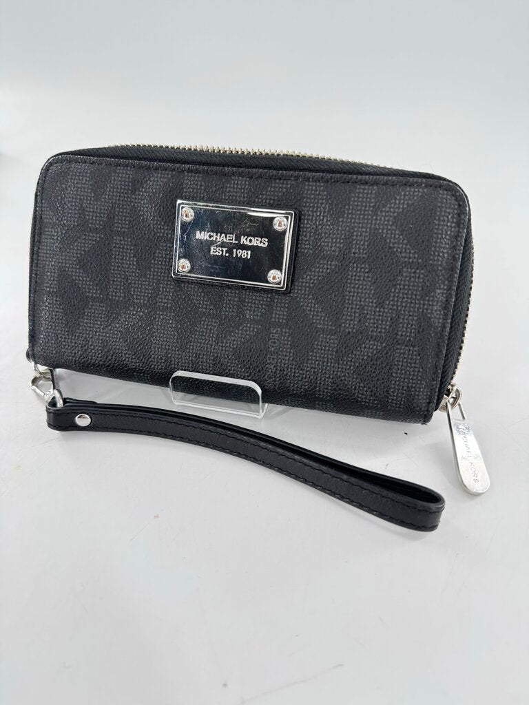 monogram zip around wallet