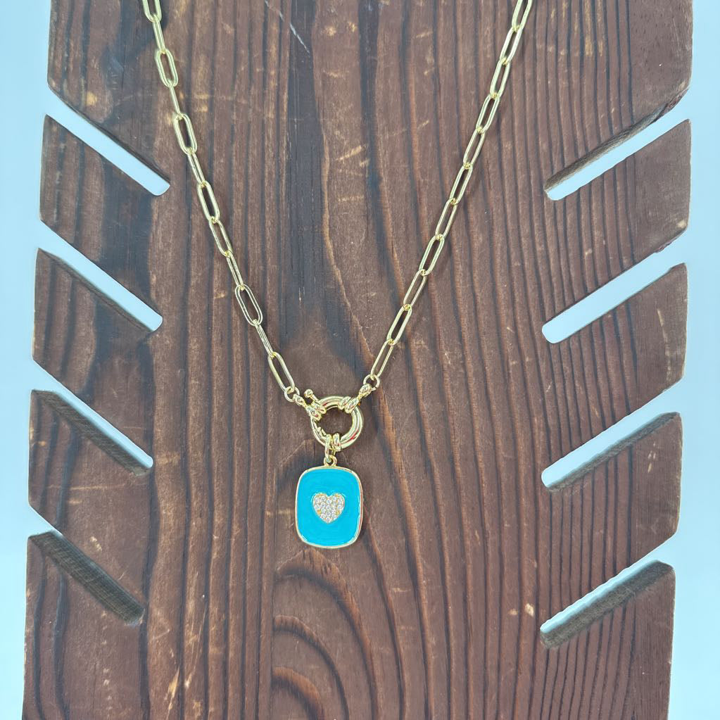 10" gold tone paperclip necklace w/ turq heart pendant