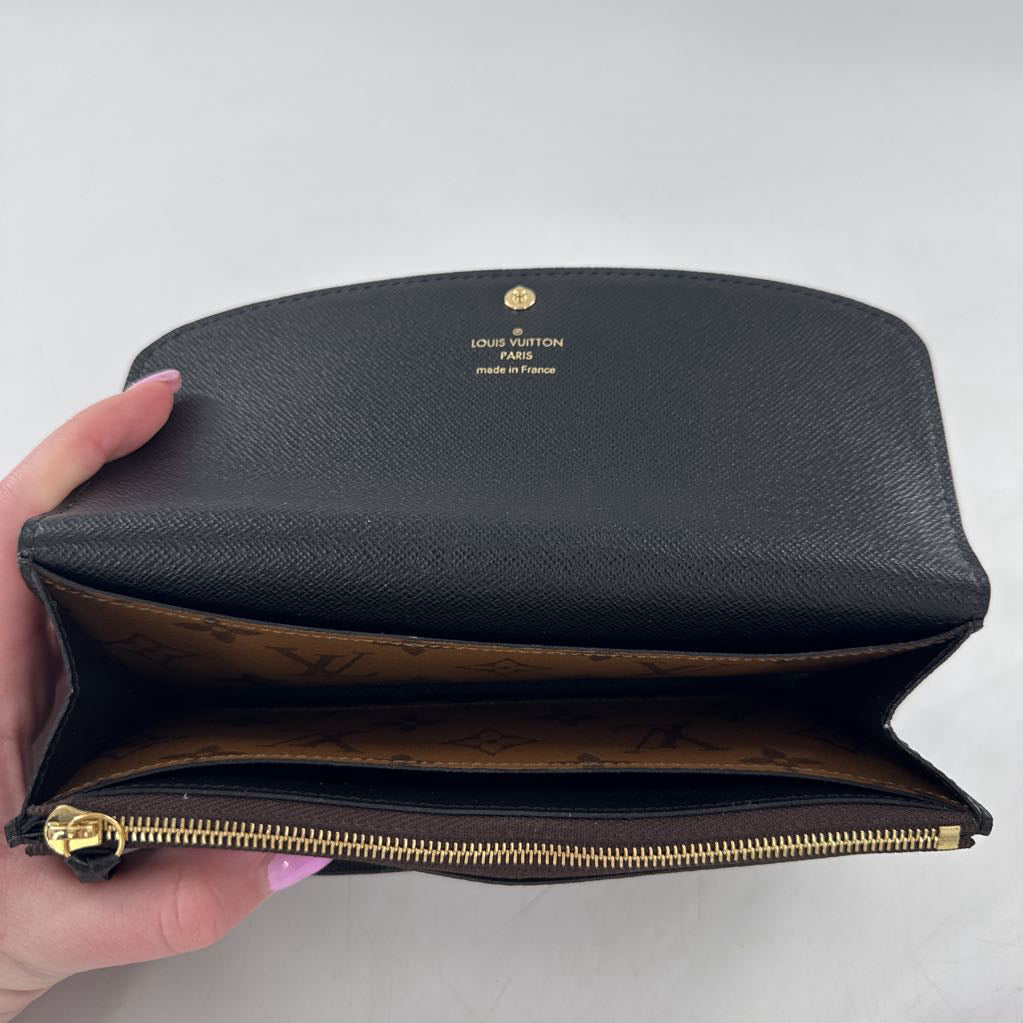 Reverse monogram bi-fold wallet