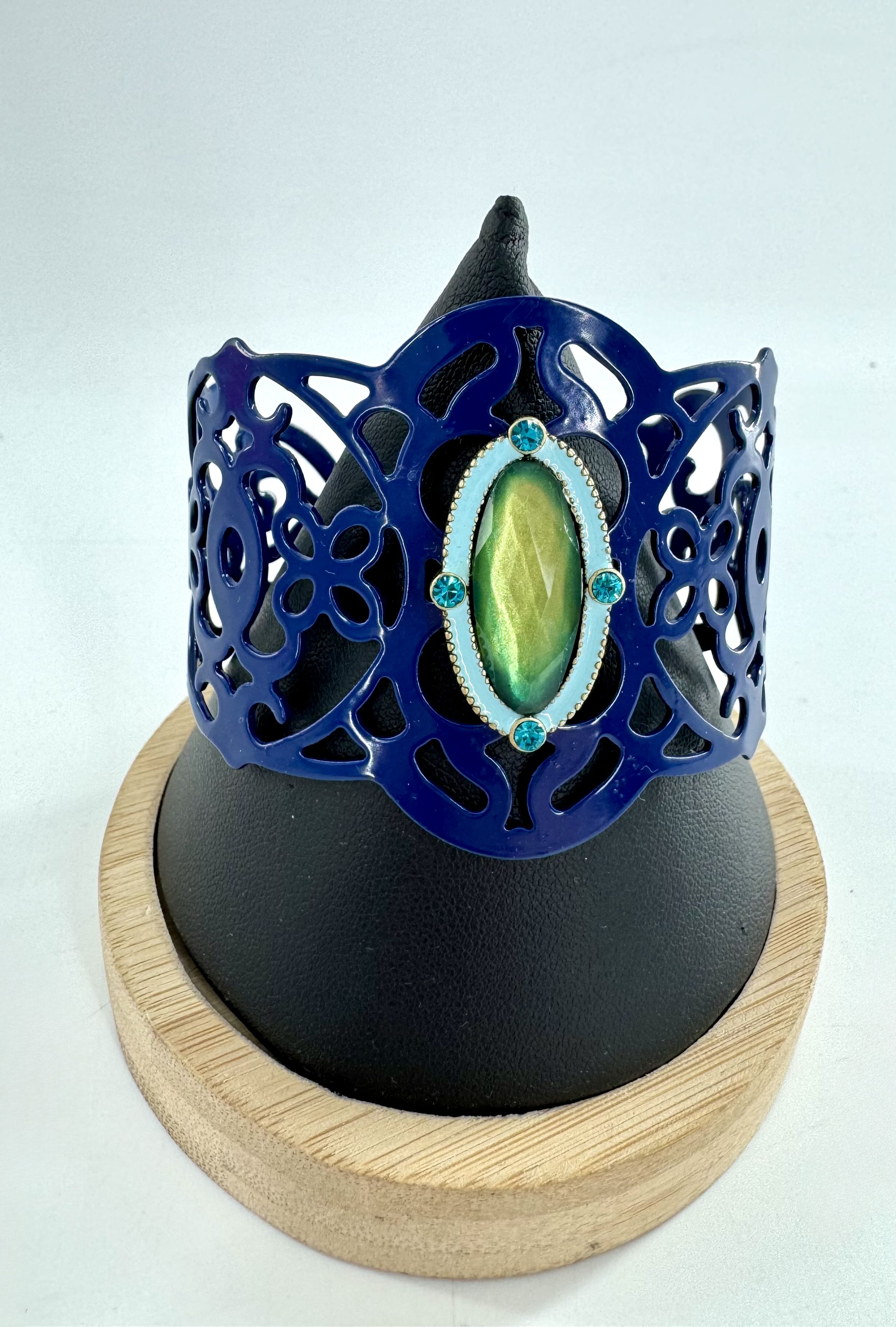 metal scroll cuff w/ green stone